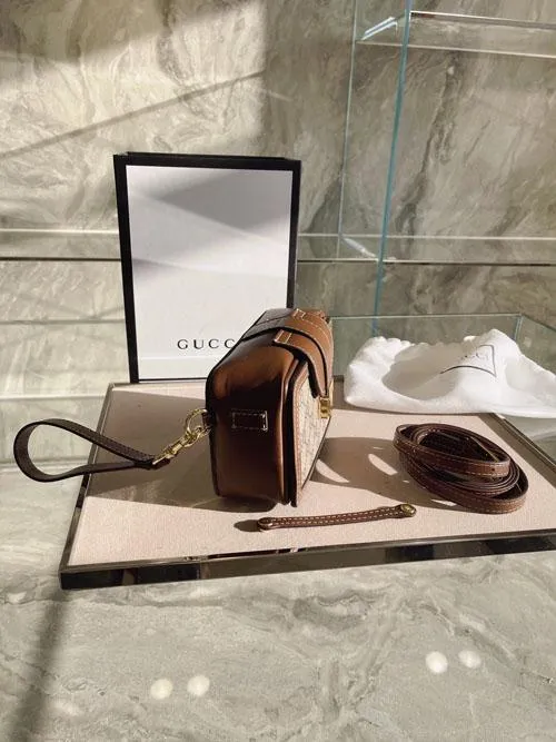 Designer Bags by Gucci 311